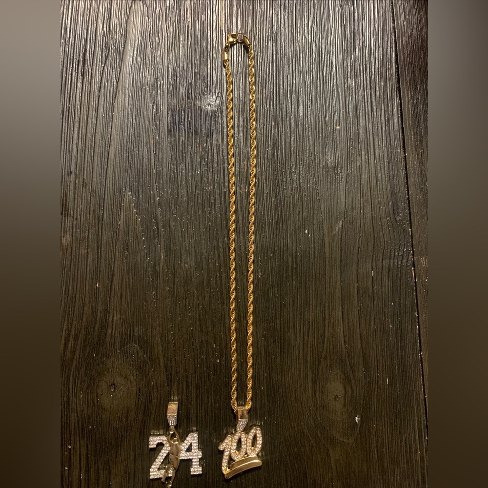 2 stainless steel gold tone chains with pendants